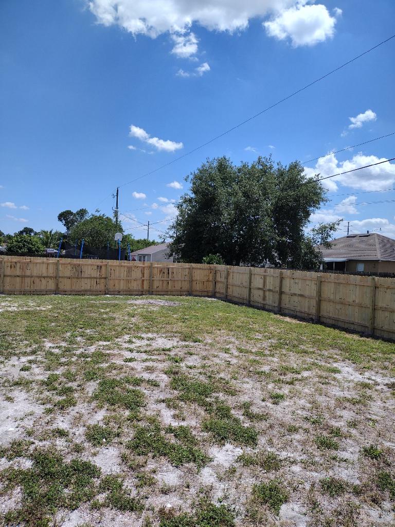 Newly installed wood privacy fence