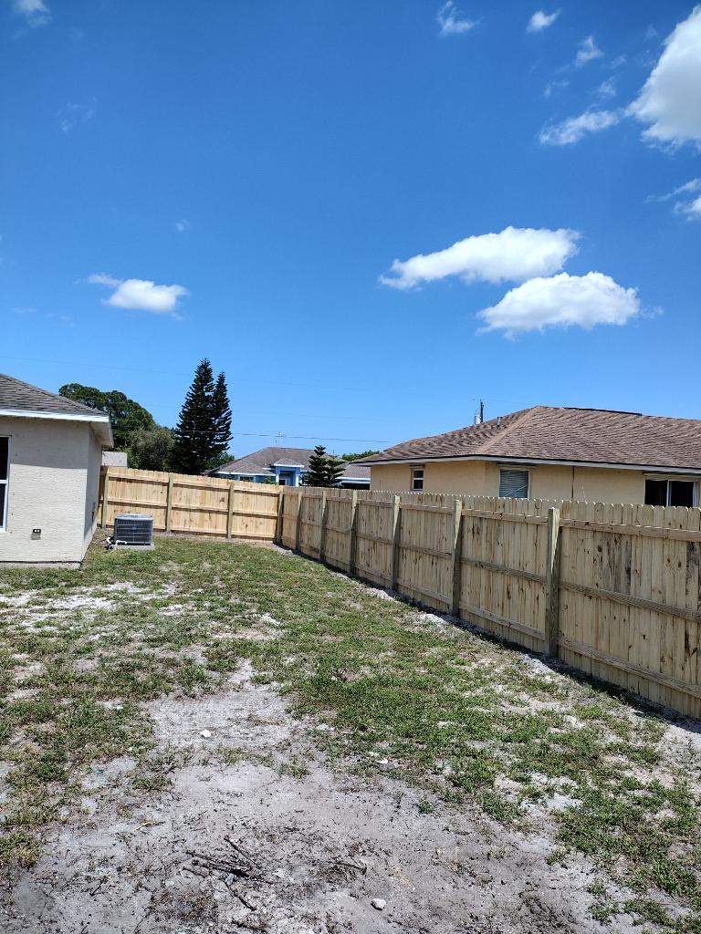 Newly installed wood privacy fence